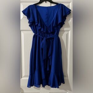New , never worn Woman’s blue 100% polyester dress. Size Large